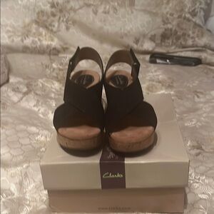 Clarks Black Wedge Shoes with Slingback Design
